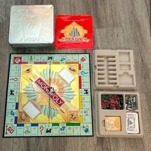 70th Anniversary Special Edition MONOPOLY in tin box. Excellent condition.